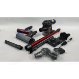 A DYSON V8 TOTAL CLEAN CORDLESS VACUUM CLEANER COMPLETE WITH VARIOUS ACCESSORIES AND CHARGER - SOLD