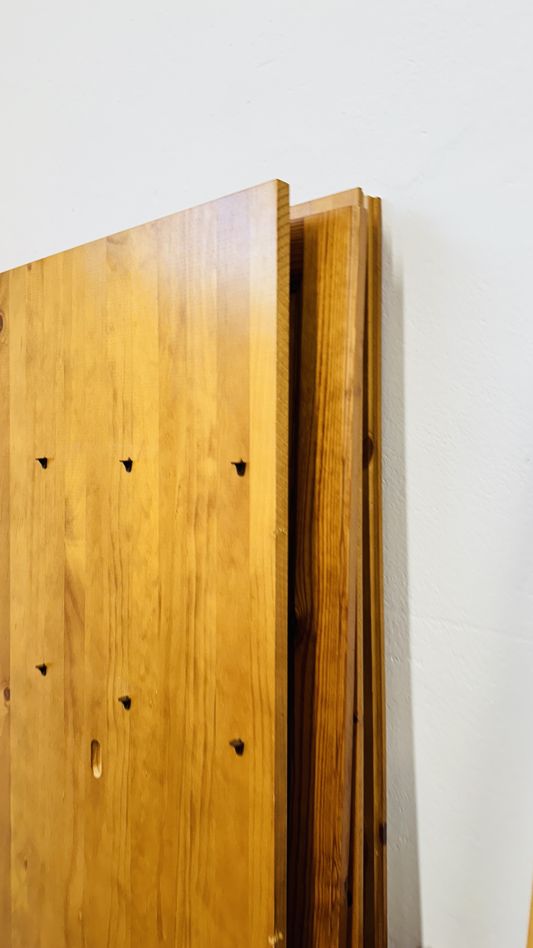 A HONEY PINE TWO DOOR WARDROBE AND A HONEY PINE TRIPLE WARDROBE (DISASSEMBLED). - Image 5 of 9