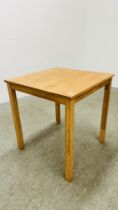 A MODERN BEECHWOOD KITCHEN DINING TABLE 69CM X 69CM.