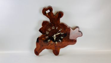 A LACQUERED FINISH NATURAL WOOD SLAB WALL CLOCK, H 60CM.