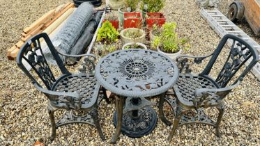 DECORATIVE CAST IRON EFFECT GARDEN BISTRO SET COMPLETE WITH PARASOL AND BASE.