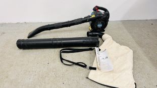 A MAKITA BHX2501 PETROL LEAF BLOWER COMPLETE WITH MANUAL - SOLD AS SEEN.