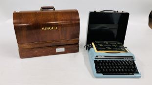 A VINTAGE SINGER SEWING MACHINE IN ORIGINAL CASE + SILVER-REED SR 180 DELUXE TYPEWRITER - SOLD AS