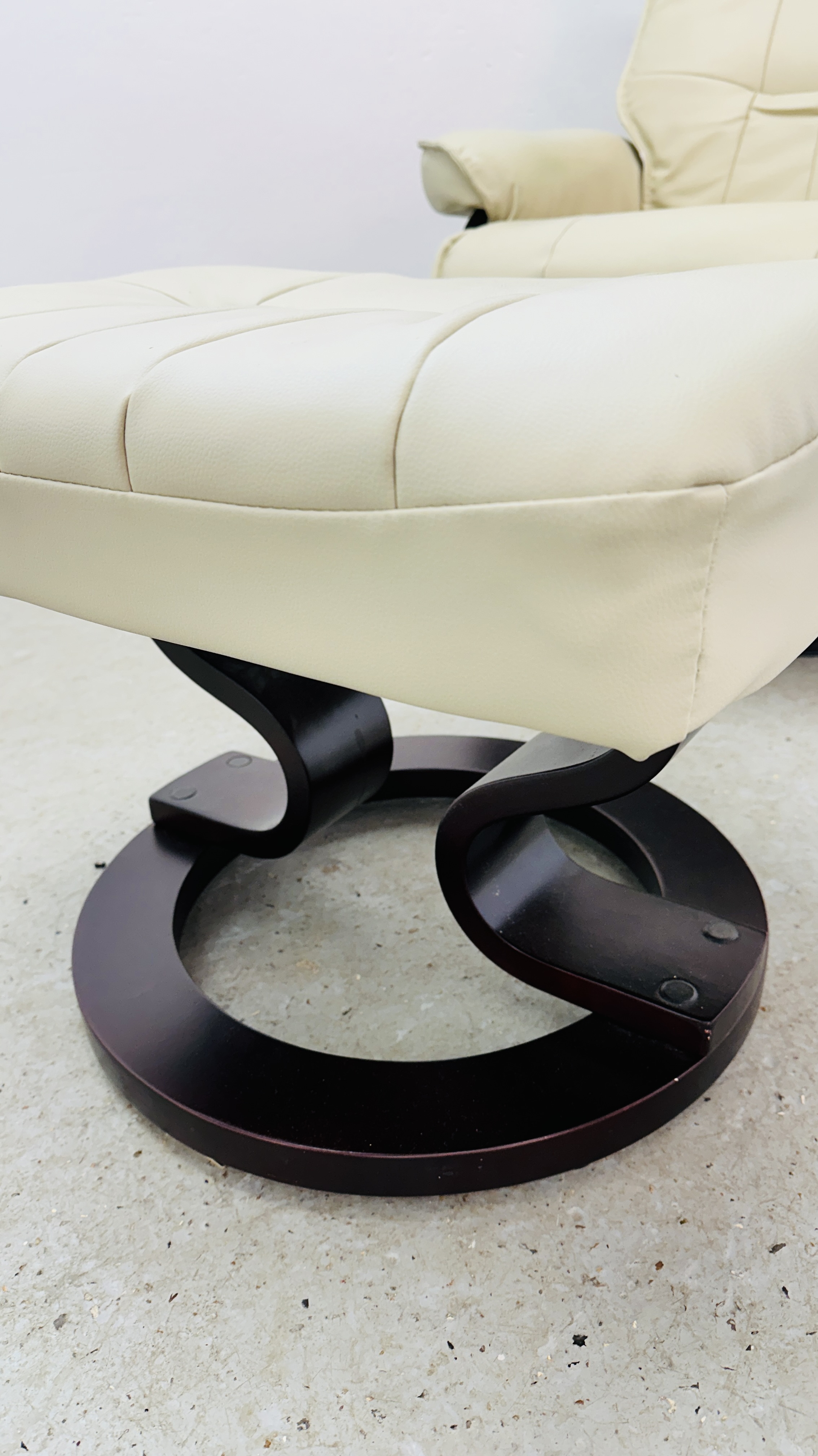 A MODERN CREAM FAUX LEATHER RECLINING RELAXER CHAIR AND FOOTSTOOL. - Image 12 of 12