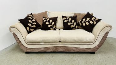 A MODERN CREAM AND MOCHA UPHOLSTERED DFS THREE SEATER SOFA + SCATTER CUSHIONS.