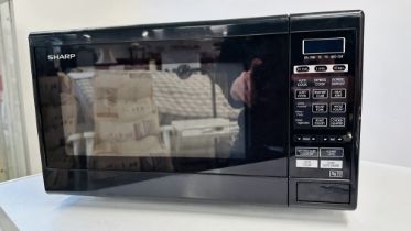A SHARP MICROWAVE - SOLD AS SEEN.