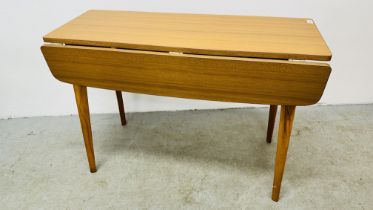 A RECTANGULAR DROP SIDE FORMICA TOP TABLE.