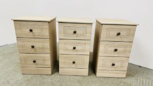 THREE MODERN "KINGSTOWN" 3 DRAWER BEDSIDE CHESTS + A MATCHING MIRROR W 43 X D 46 X H 74CM.