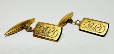 A PAIR OF 9CT GOLD MONOGRAMMED CUFFLINKS.