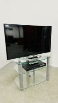 A SONY BRAVIA 42 INCH TV COMPLETE WITH REMOTE AND MODERN GLASS TV STAND AND CAMBRIDGE AUDIO DVD