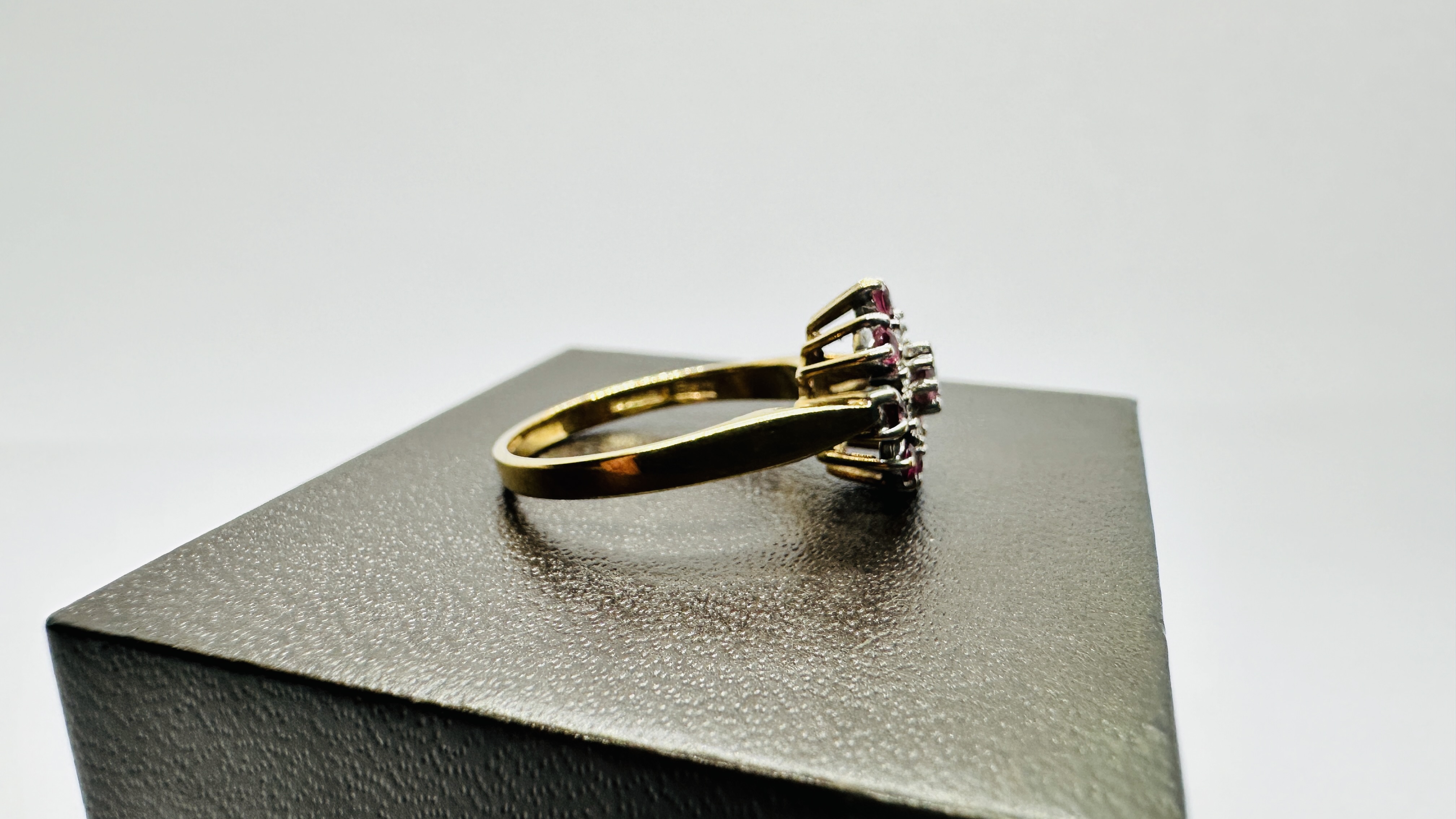 A 9CT GOLD RUBY AND DIAMOND CLUSTER RING. SIZE P/Q. - Image 3 of 11