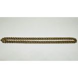 A YELLOW METAL ROPE TWIST NECKLACE - L 72CM.