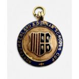 A VINTAGE 9CT GOLD AND ENAMELED MEDAL,