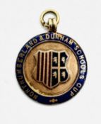 A VINTAGE 9CT GOLD AND ENAMELED MEDAL,