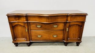 A MAHOGANY 3 OVER 3 DRAWER SERPENTINE SIDEBOARD WITH CUPBOARDS TO EITHER END - 170CM W X 57CM D X