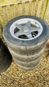 A SET OF FOUR VW ALLOY WHEELS AND TYRES - CONDITION OF SALE FOR OFF ROAD USE ONLY.