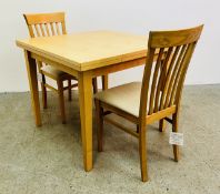 MODERN BEECH WOOD EFFECT EXTENDING DINING TABLE AND 2 CHAIRS.