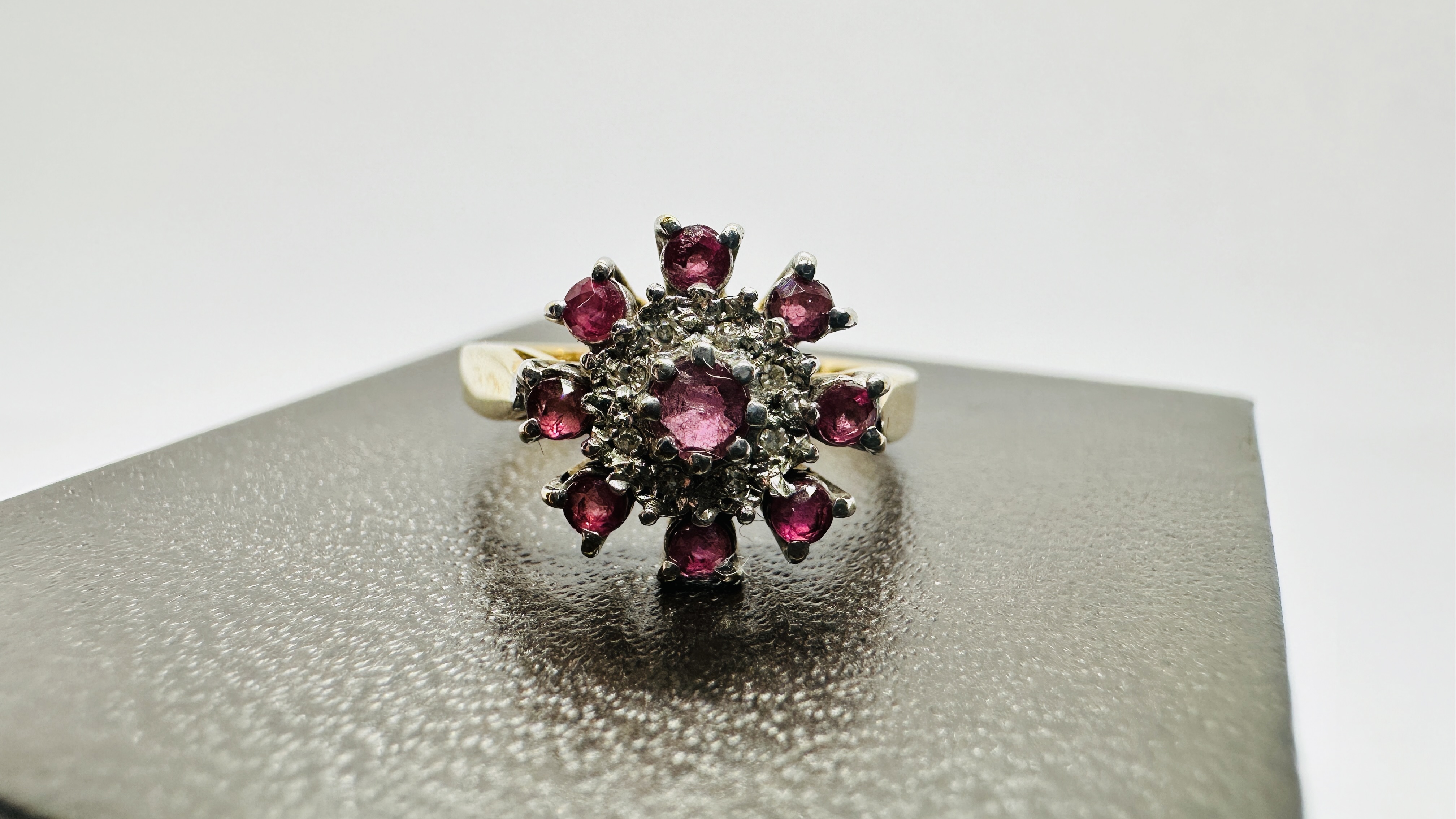 A 9CT GOLD RUBY AND DIAMOND CLUSTER RING. SIZE P/Q. - Image 2 of 11