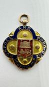 A VINTAGE 9CT GOLD AND ENAMELED MEDAL,