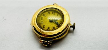A VINTAGE 18CT GOLD CASED WATCH FACE.