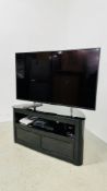 A SONY 49 INCH FLAT SCREEN TV MODEL 49XB8196 COMPLETE WITH GLASS DESIGNER TV STAND AND PANASONIC