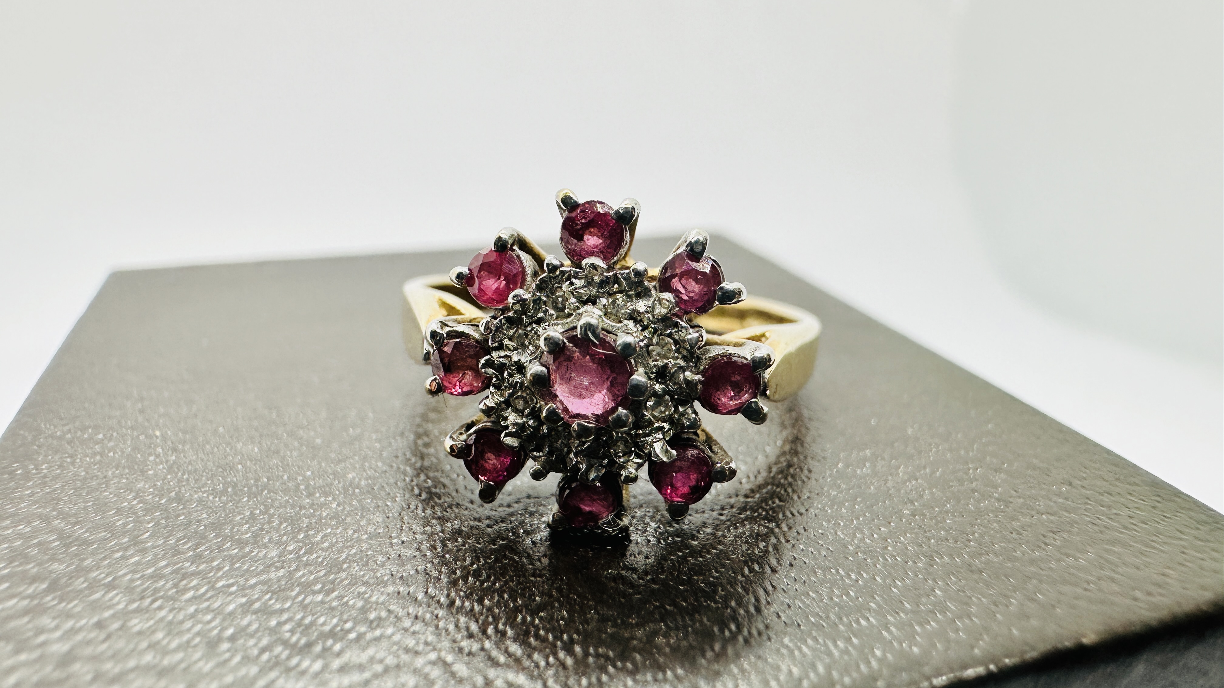 A 9CT GOLD RUBY AND DIAMOND CLUSTER RING. SIZE P/Q. - Image 6 of 11