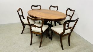 A SET OF 6 VICTORIAN ROSEWOOD DINING CHAIRS COMPLETE WITH A MAHOGANY OVAL TILT TOP DINING TABLE.