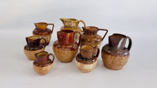 A GROUP OF VINTAGE STONEWARE JUGS TO INCLUDE DOULTON LAMBETH EXAMPLES ALONG WITH TWO EXAMPLES IN