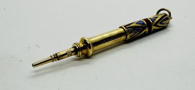 A YELLOW METAL AND ENAMEL S. MORDAN & CO PROPELLING PENCIL.