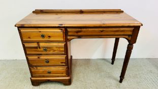 HONEY PINE 5 DRAWER DRESSING TABLE - W 111CM X D 45CM X H 78CM.