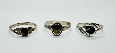 A GROUP OF 3 SILVER RINGS SET WITH BLUE JOHN STONES.