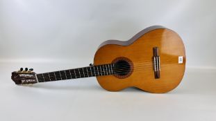 A YAMAHA C-40 ACOUSTIC GUITAR.