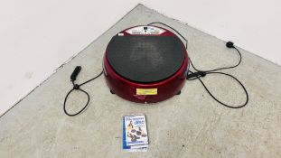 A VIBRAPOWER DISC WORKOUT MACHINE WITH INSTRUCTIONS - SOLD AS SEEN.