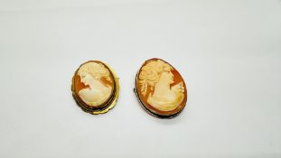 TWO VINTAGE CAMEO PENDANT / BROOCHES TO INCLUDE A YELLOW METAL AND SILVER EXAMPLE.