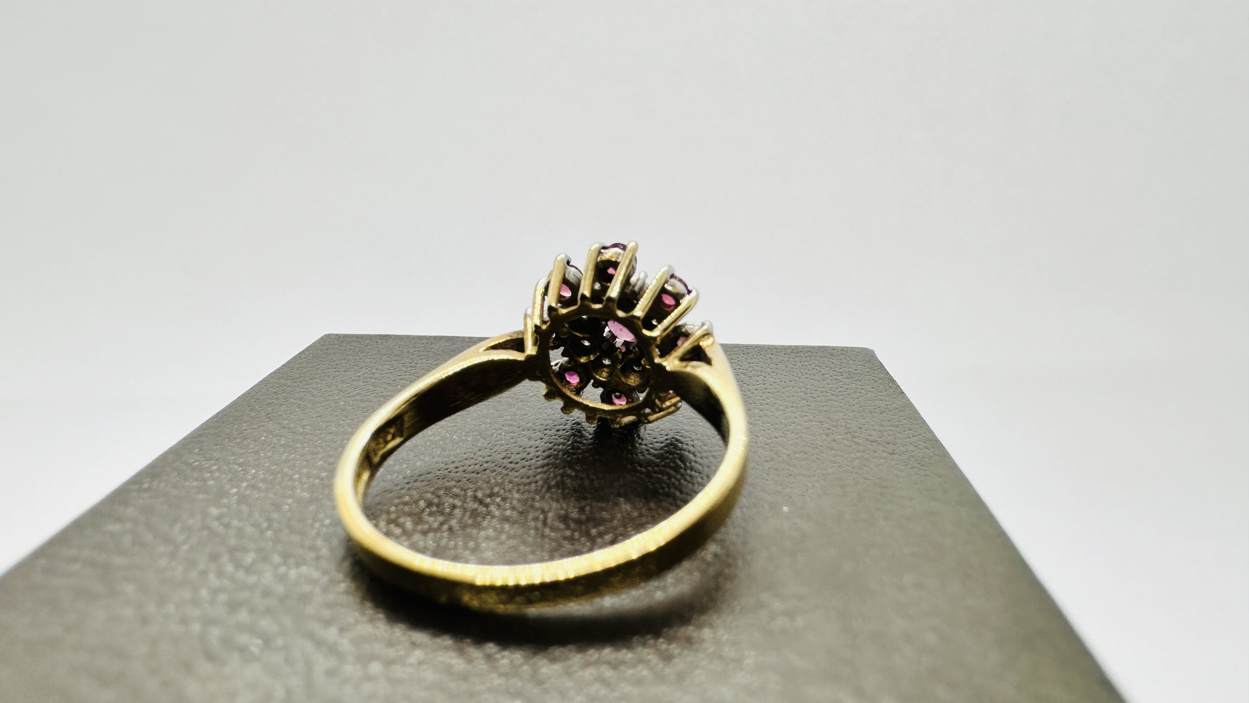 A 9CT GOLD RUBY AND DIAMOND CLUSTER RING. SIZE P/Q. - Image 4 of 11