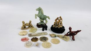 A GROUP OF ORIENTAL CARVED HARDSTONE FIGURE GROUPS AND DISCS.