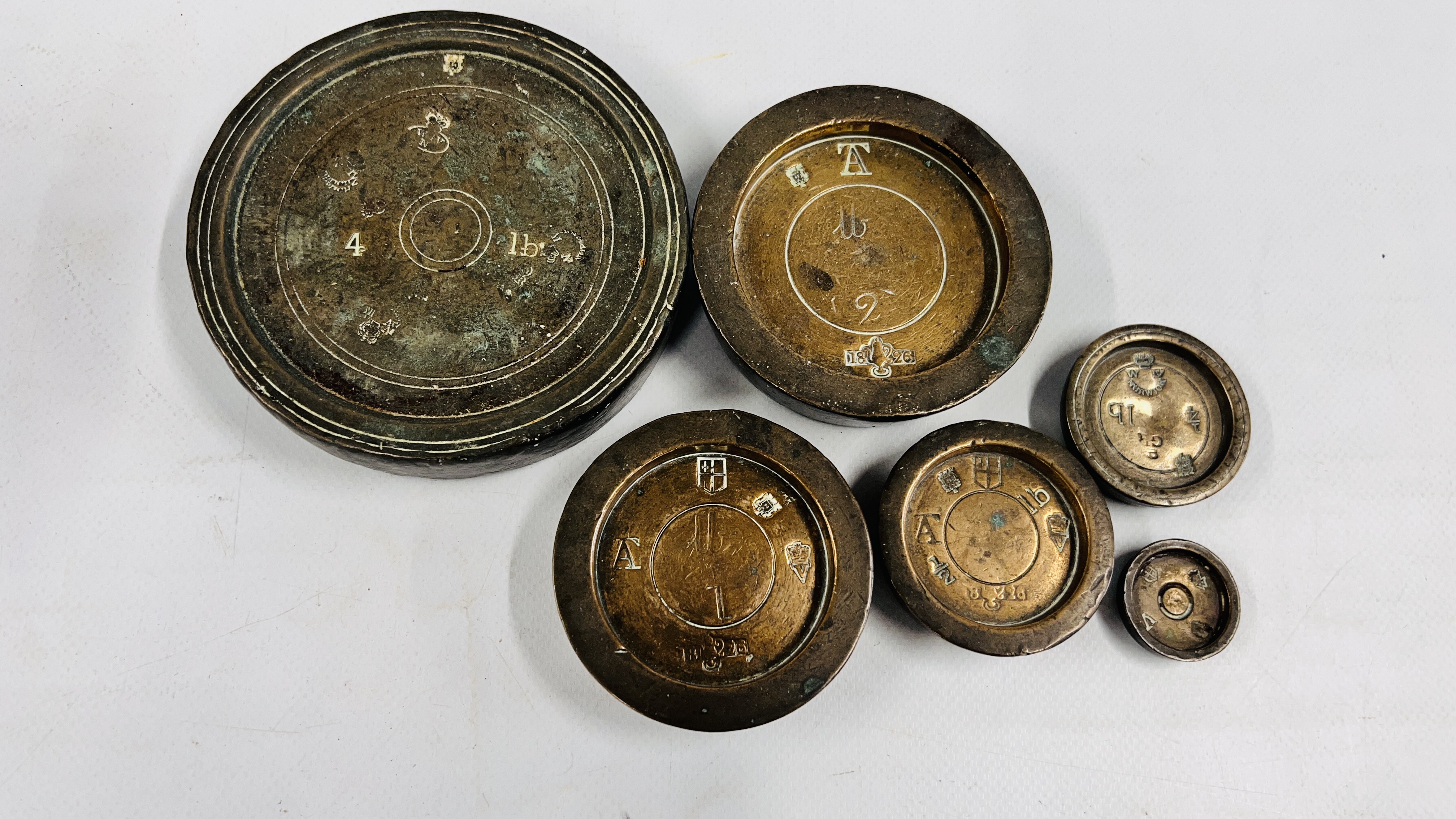 A GROUP OF 6 VINTAGE GRADUATED WEIGHTS OF LOCAL INTEREST ALONG WITH A CAST MORTAR. - Image 7 of 11
