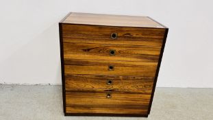 A MID CENTURY ROSEWOOD FINISH FIVE DRAWER CHEST WITH CONCEALED BRASS DRAWER PULLS IN THE STYLE OF