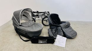 A SILVER CROSS SLEEPOVER PRAM COMPLETE WITH MATCHING BAG, HANDBAG, TRAY AND INSTRUCTIONS.