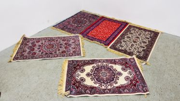 FIVE VARIOUS SMALL PERSIAN STYLE RUGS EACH 110CM X 68CM.