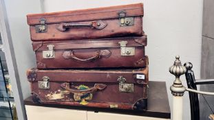 3 VINTAGE LEATHER BOUND SUITCASES.