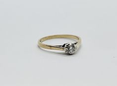 A 9CT GOLD DIAMOND SOLITAIRE.