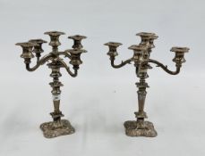 A PAIR OF GOOD QUALITY HEAVY SILVER PLATED 4 BRANCH CANDELABRA'S .