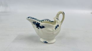A LOWESTOFT BLUE AND WHITE DOLPHIN EWER CREAM BOAT, WITH FLORAL DECORATION, 1770-1780, HEIGHT 5CM,