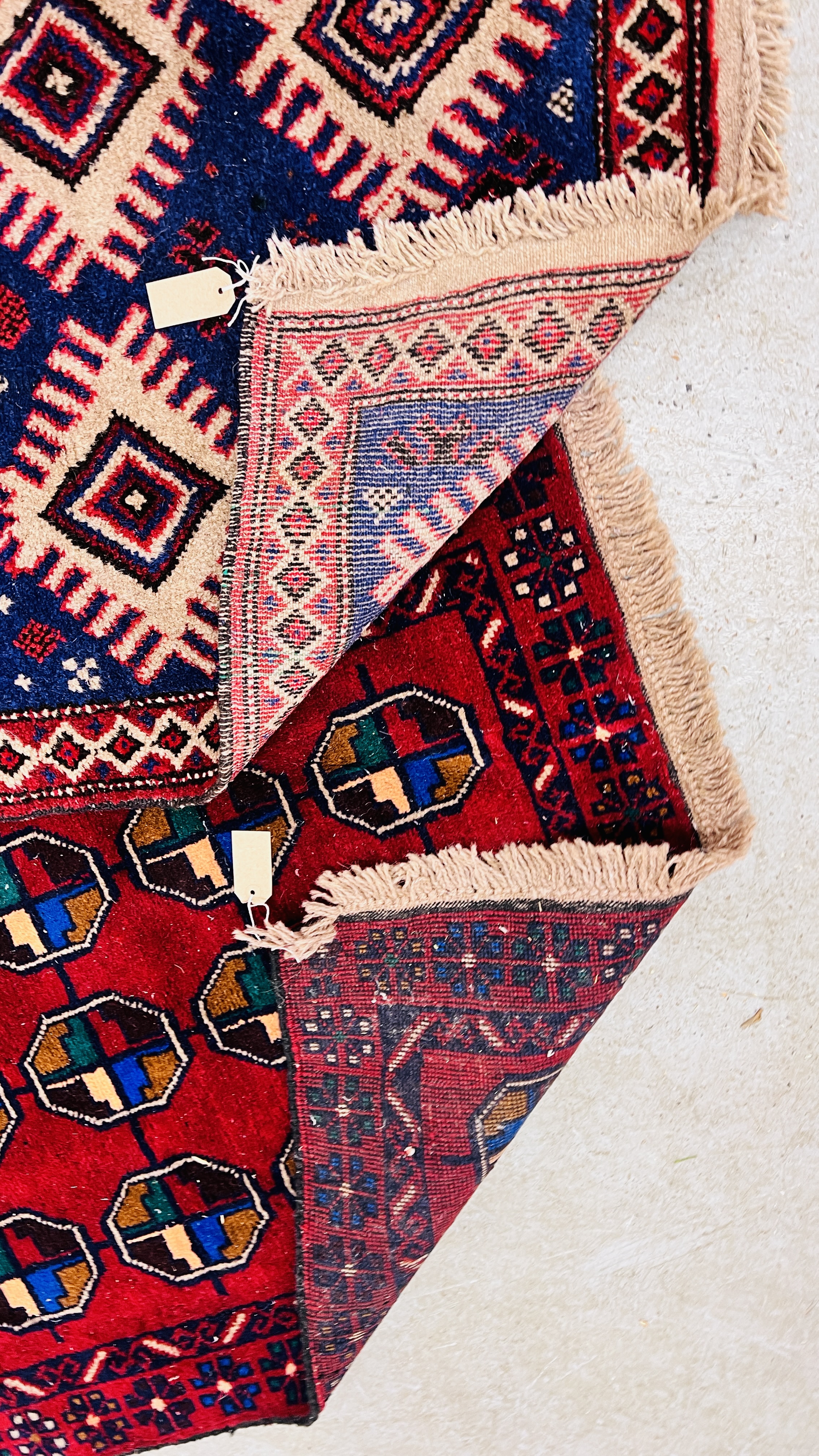 TWO RED / BLUE PATTERNED EASTERN RUGS EACH 133CM X 86CM. - Image 10 of 10