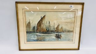 A FRAMED WATERCOLOUR DEPICTING "FISHING BOATS ENTERING HARBOUR" BEARING SIGNATURE C.F.