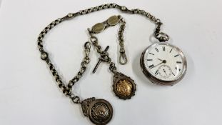 A SILVER POCKET WATCH LONDON 1883 WITH 2 WHITE METAL WATCH CHAINS + SILVER FOBS.