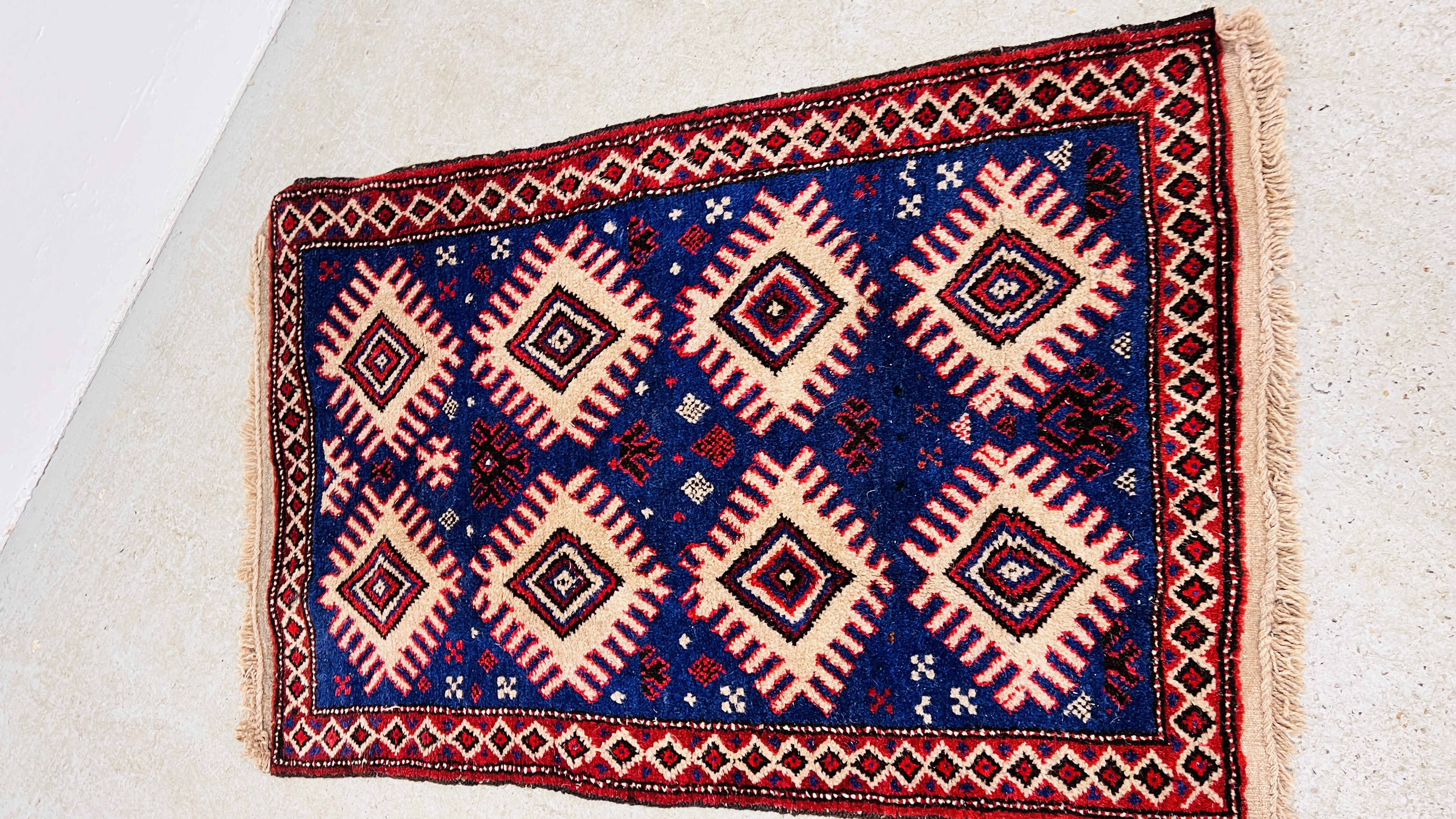 TWO RED / BLUE PATTERNED EASTERN RUGS EACH 133CM X 86CM. - Image 2 of 10