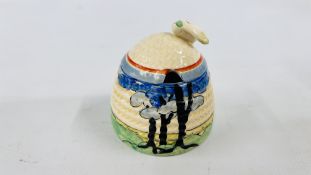 A CLARICE CLIFF BIZARRE SMALL HONEY POT, THE COVER WITH RED AND BLUE BANDS,