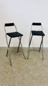 TWO FOLDING COMPOSITE METAL FRAMED BREAKFAST BAR STOOLS.